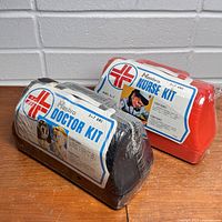 Doctor and Nurse kits side by side, showing sealed condition and labels