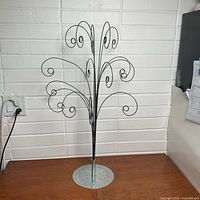 Full view of wire ornament display stand showing branches and height