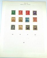 Full album sheet displaying 12 stamps in three rows