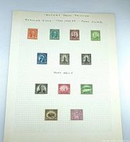 Full album page with twelve mounted stamps