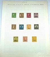 Full album page displaying all 11 Kansas overprint stamps