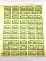 Front view of complete stamp block showing 8 × 7 arrangement, green 1-cent Army/Navy stamps with plate number 23011 in selvage