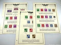Three album sheets showing mounted US commemorative stamps 1939-1940