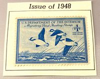 Front of 1948 $1 duck stamp mounted on card