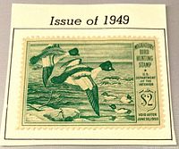 front view of 1949 $2 Migratory Bird Hunting stamp on album paper labeled Issue of 1949