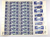 Front view of both stamp sheets showing designs and plate numbers