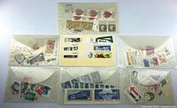 Overall lot showing six envelopes and stock card of stamps
