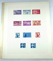 Full album sheet with all 11 mounted stamps visible