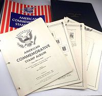 Dust cover, binder and loose album pages displayed together