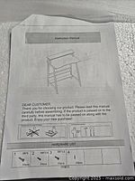 Instruction manual showing desk design and hardware list