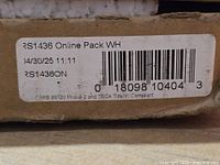 Box label showing model RS1436ON and barcode
