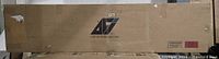 Factory-sealed shipping box showing AFI Furnishings logo