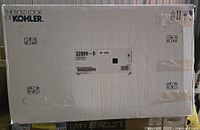 Factory-sealed Kohler box front showing brand