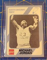 Front of card showing Michael Jordan image, series title, Coca-Cola logo, card in sleeve