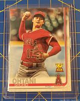 Front of Shohei Ohtani Topps trading card in protective sleeve