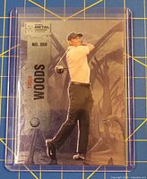 Front of Tiger Woods Skybox Metal Universe card #050 in sleeve