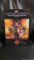 Front cover of Marvel Captain America: The Winter Soldier Prelude paperback graphic novel