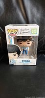 Front view of boxed Funko Pop Pedro figure #205