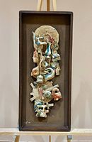 Full view of framed mixed-media relief wall art