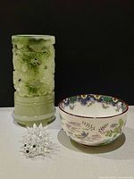 Group shot: green carved vase, Royal Crown Derby bowl, Swarovski hedgehog