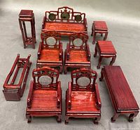 All 10 pieces of miniature furniture arranged