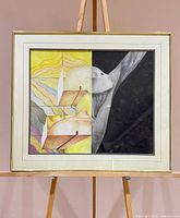 Full view of framed poster on easel showing artwork, mat and frame