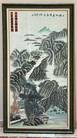 Full view of framed painting showing landscape scene and frame