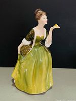 Front view of Royal Doulton ‘Fleur’ figurine showing full gown and pose