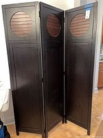Full view of 3-panel room divider standing open