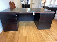 Front view showing full desk, dual pedestals and knee space