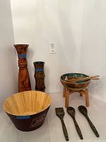 Full lot showing two vases, large bamboo bowl, salad bowl on stand with servers, three utensils