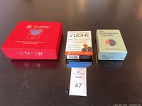 Front view showing SNOW kit box, Getting Things Done cards, My Photography Toolbox deck