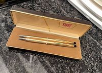 Open Cross case showing two gold-filled pens