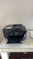 Front and top view of HP OfficeJet Pro 6978 printer on table