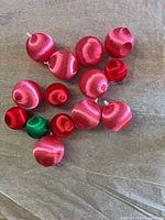 Group of satin Christmas balls showing colors and quantity