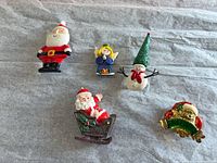 overview of all five Christmas brooches