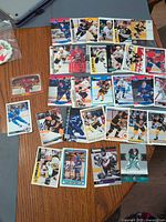 Overview of 30 hockey cards spread on table