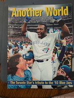 Front cover showing title and Blue Jays celebration image