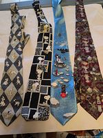 Four neckties laid out together