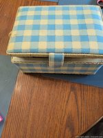 top view of blue gingham sewing basket