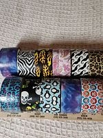 All eleven decorative duct tape rolls displayed on two rows