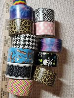 All rolls stacked showing variety of patterns