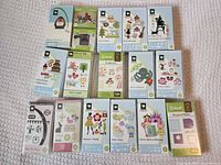 All 15 Cricut Expression cartridges laid out to show box fronts
