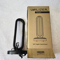 Lamp next to branded box