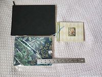 Overview of three pads with ruler for scale