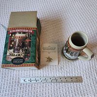 stein, open box, COA, ruler for scale