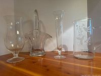 Front view of all four etched glass pieces
