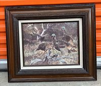 Front view of framed artwork showing image, mat and frame