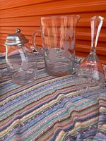 Front view pitcher, tankard with lid, bell showing etched fruit motif