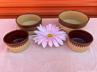 Group of four TG Green Granville bowls